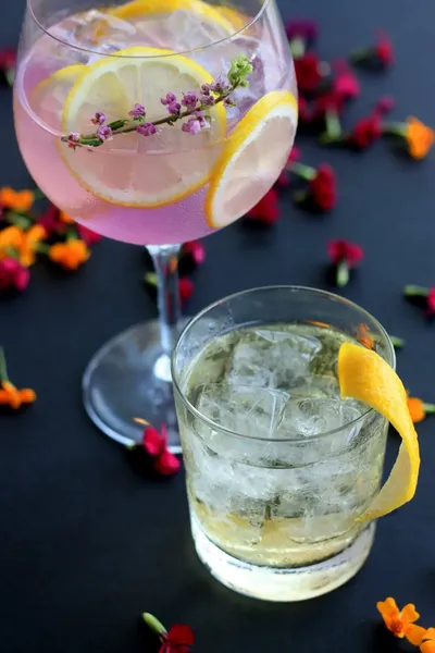 Pink gin cocktail with citrus and dried flowers